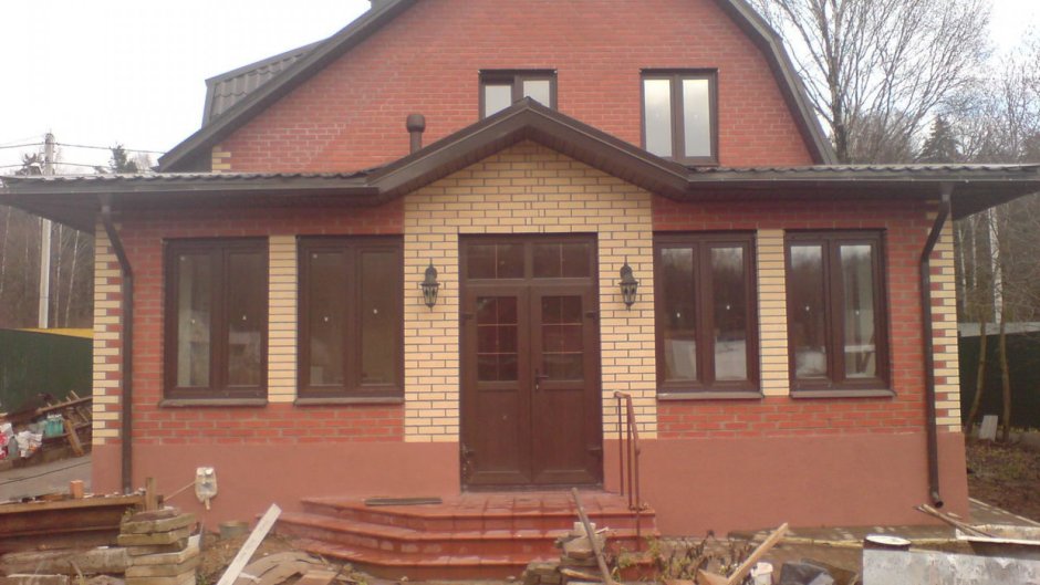 Пристройка к кирпичному дому