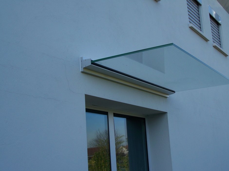 Круглый козырек над крыльцом