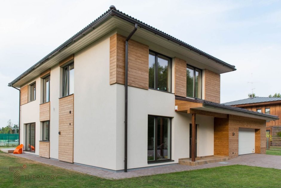 Комбинированный фасад штукатурка и планкен