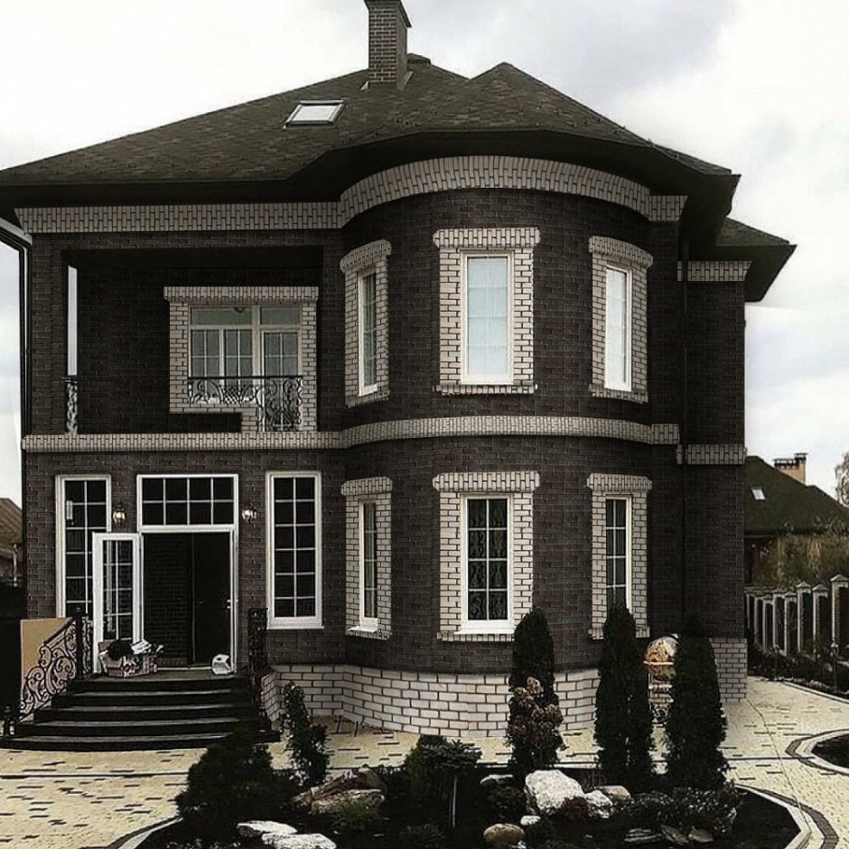 Фасады коттеджей из кирпича