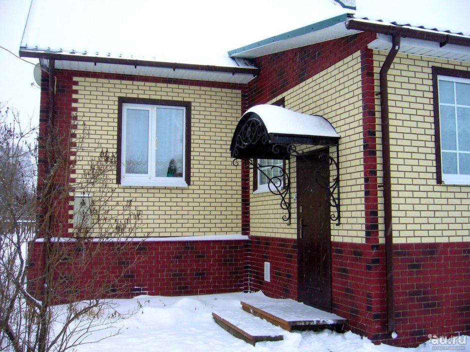 Обшивка старого дома под кирпич