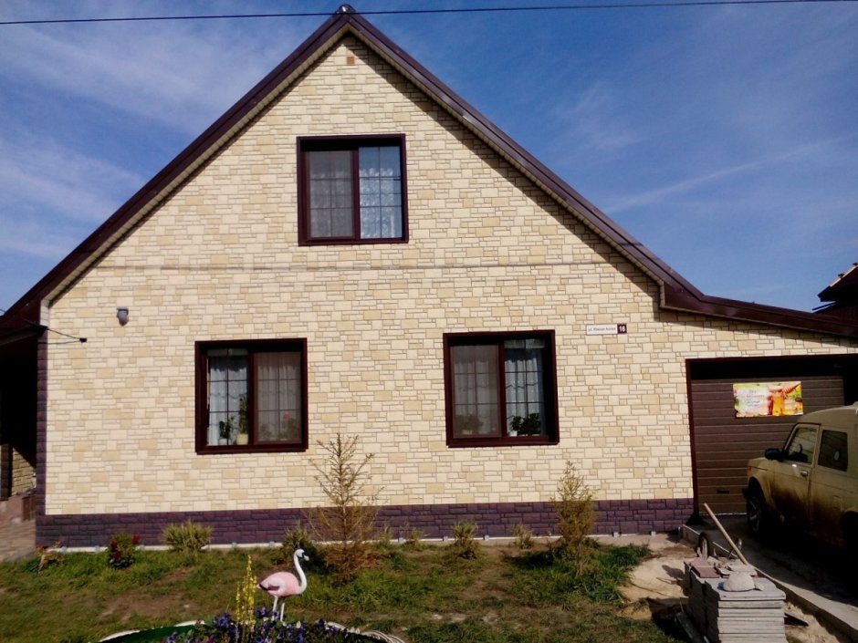 Одноэтажный дом обшитый панелями