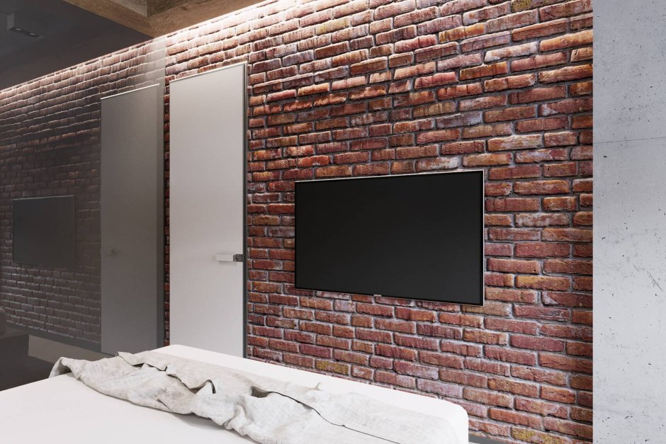 Телевизор на кирпичной стене