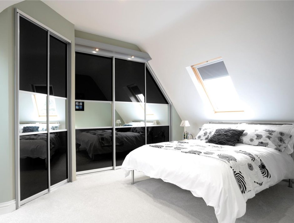 Шкафы со скошенным углом в спальню