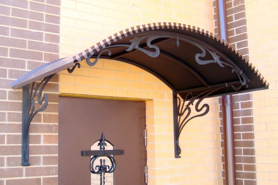 Раздвижной кованый козырек