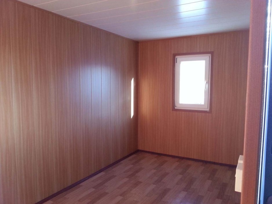 Отделка бытовки МДФ панелями