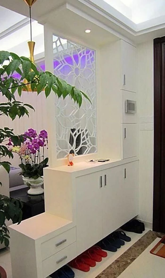 Зонирование комнаты комодом