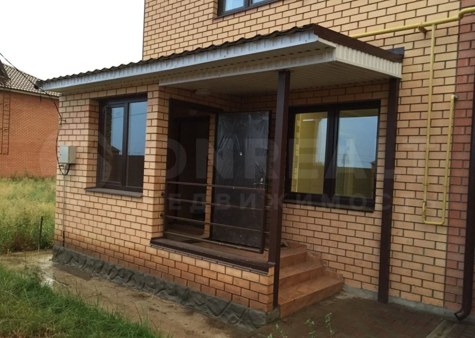 Веранда из кирпича пристроенная к дому