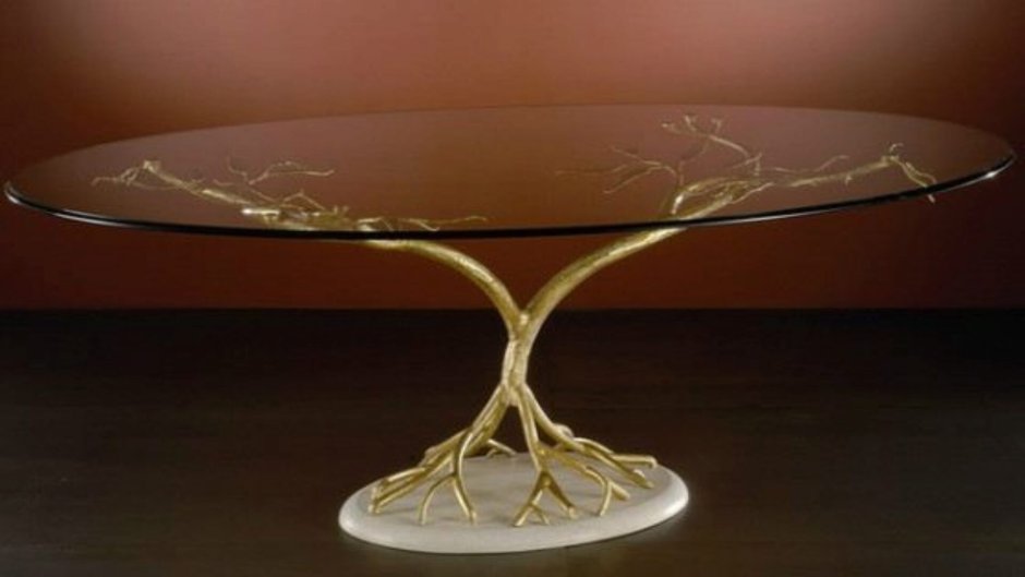 Дизайнерские столы из стекла