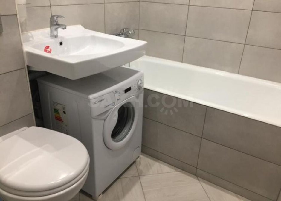 Раковина над стиральной машиной