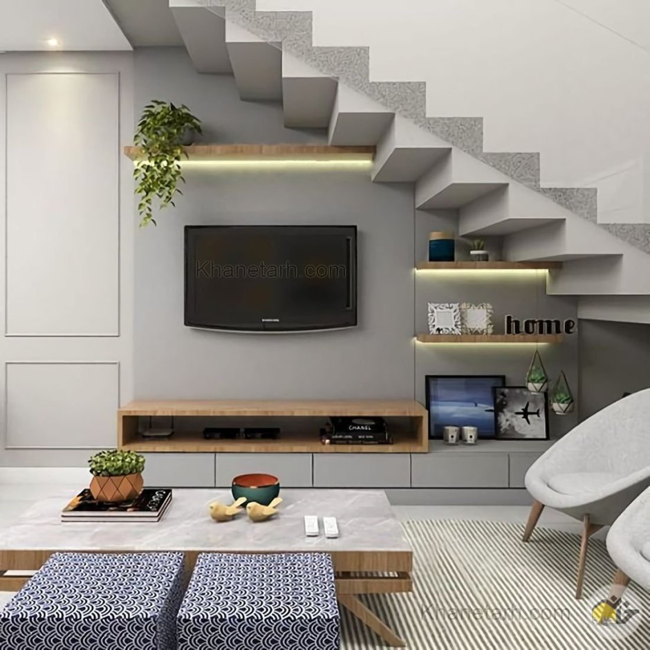 Интерьер гостиной с лестницей