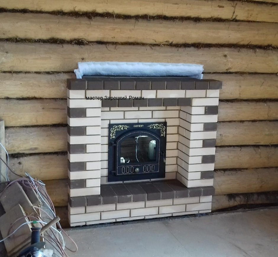 Банная печь Гефест обложенная кирпичом