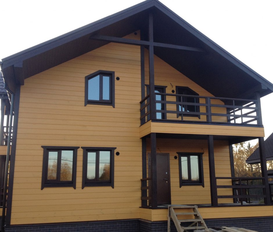 Покраска дома из имитации бруса