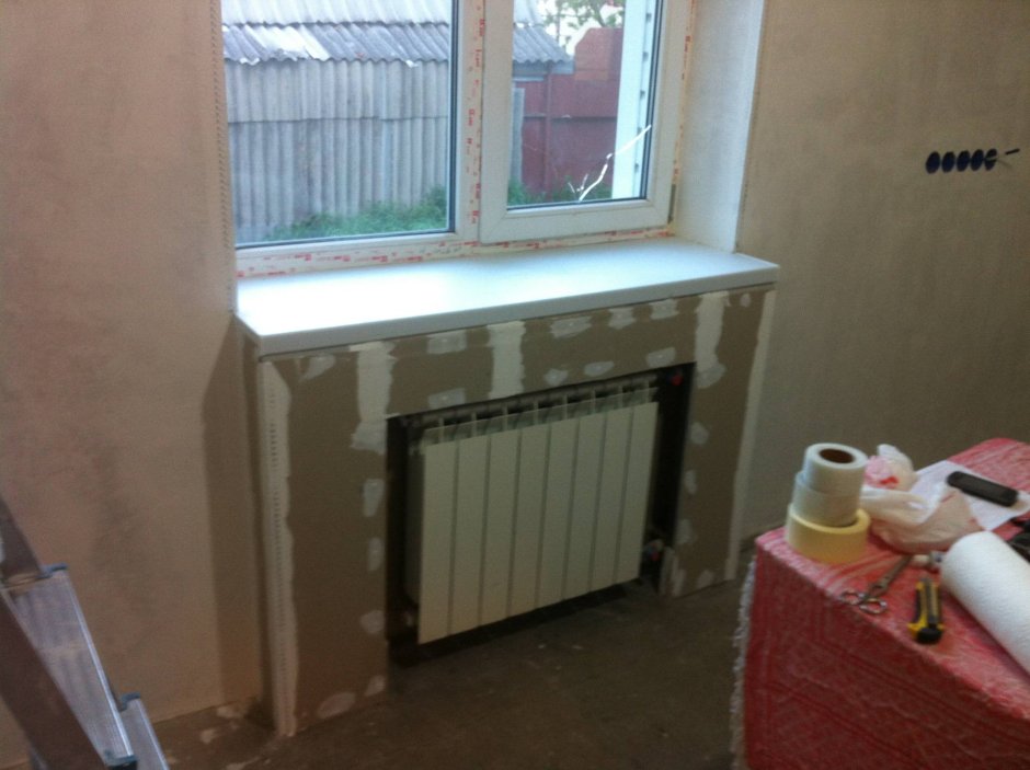 Батарея за гипсокартоном