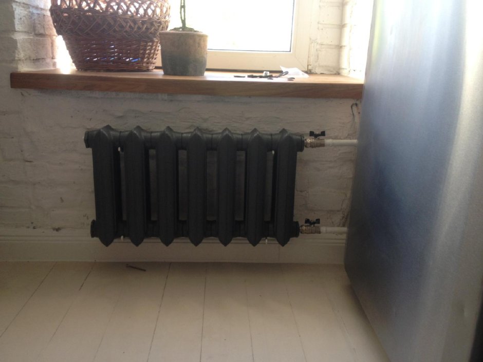 Монтаж чугунной батареи