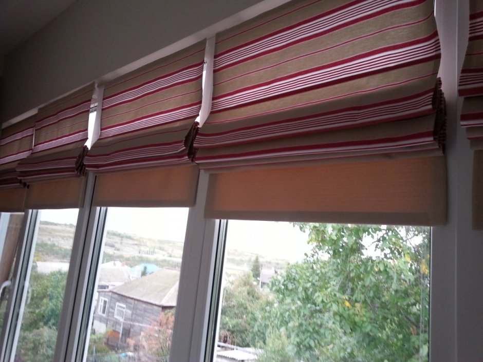 Римские шторы на эркерное окно